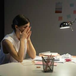 Exhausted woman with allergy fatigue.