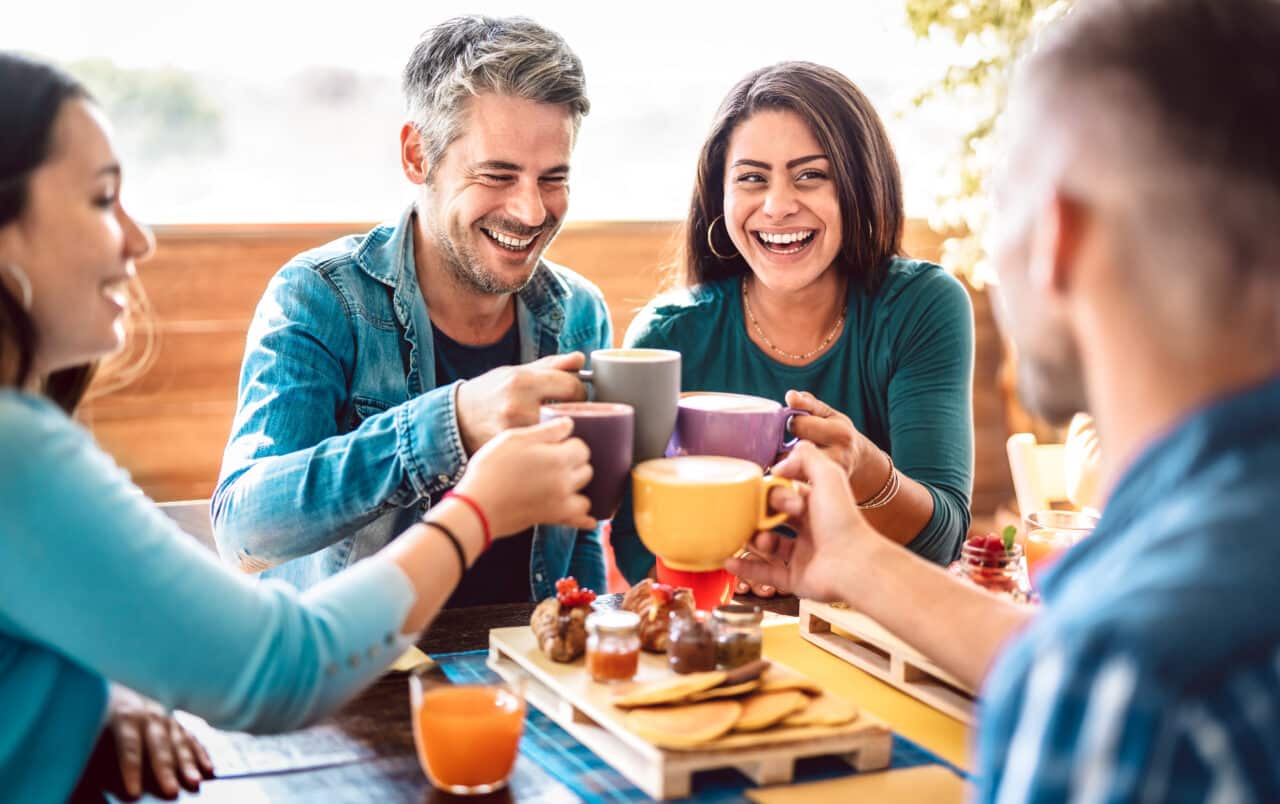 Friend group meets up for coffee to stay connected
