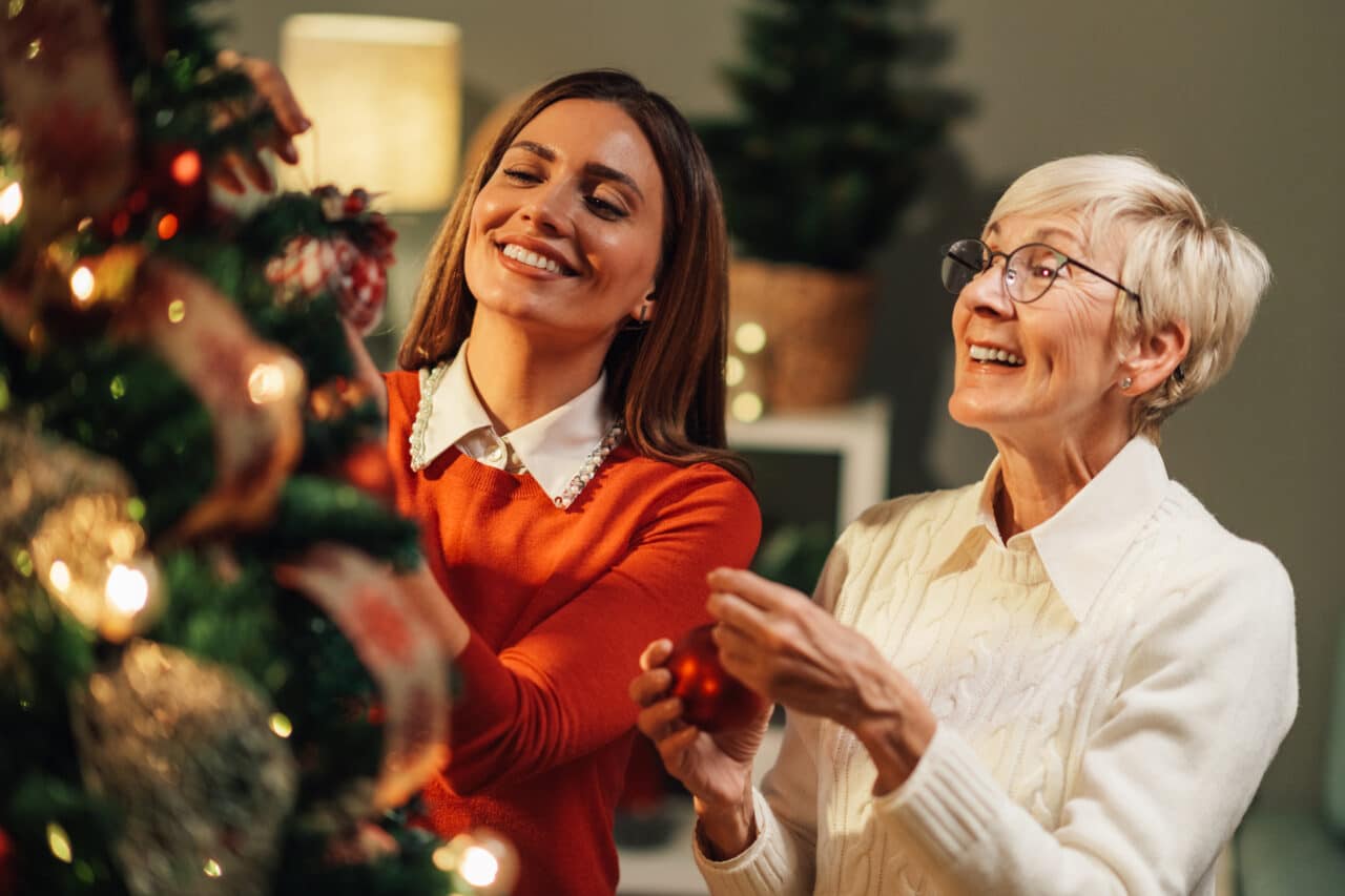 Decorating the Christmas tree together.