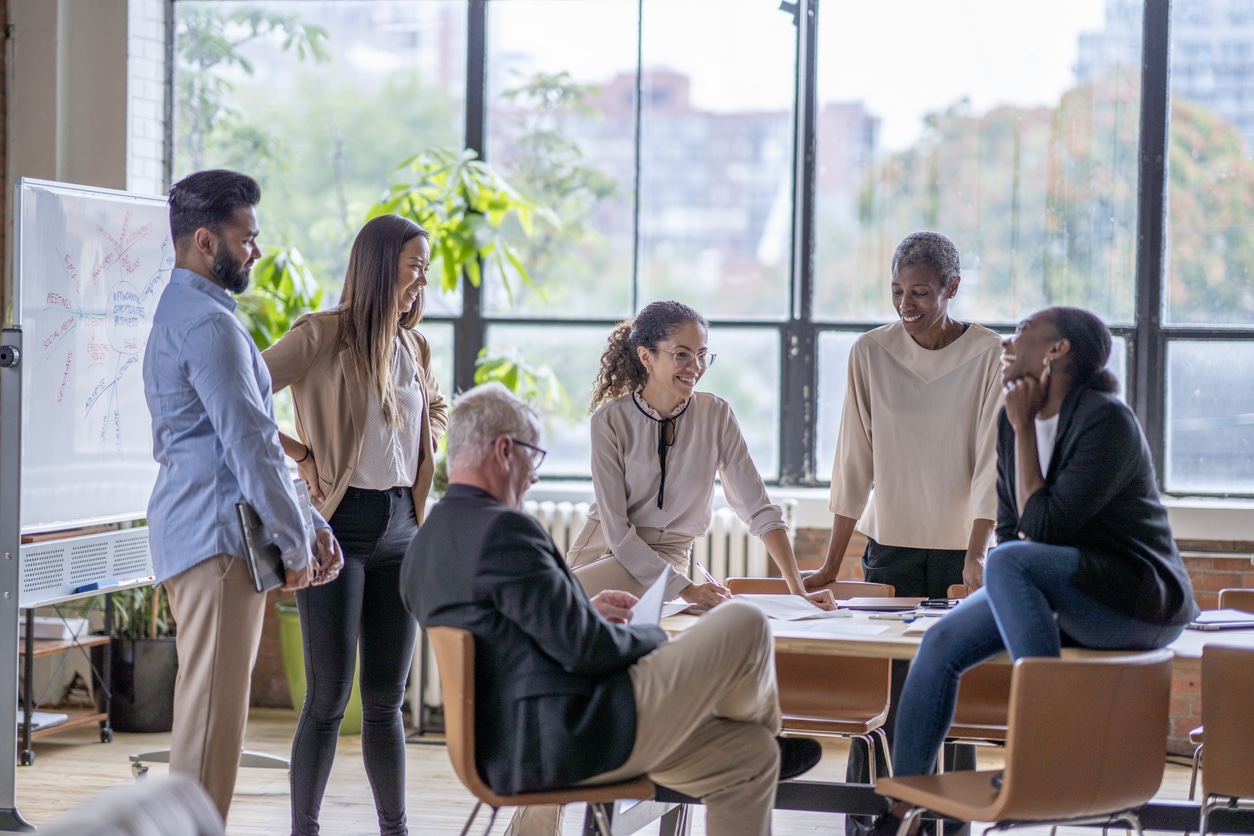 Group of happy coworkers having a productive meeting