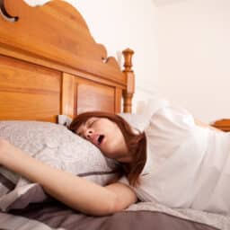 Woman sleeping with her mouth open